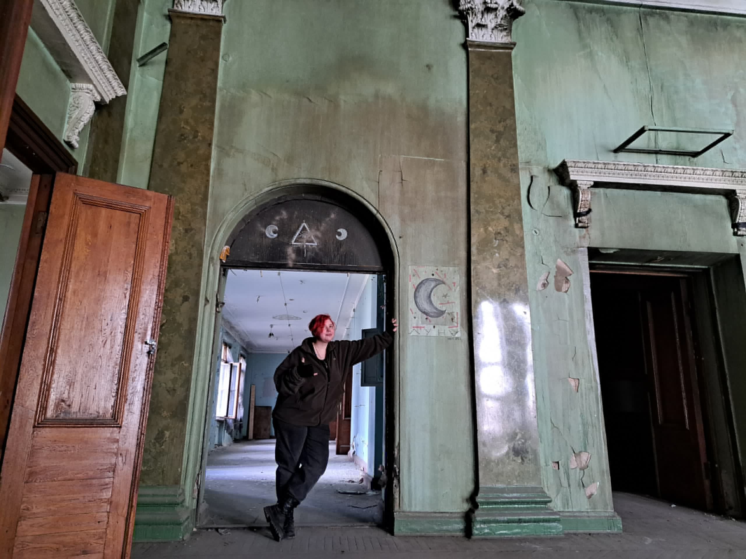 Kai exploring an abandoned building